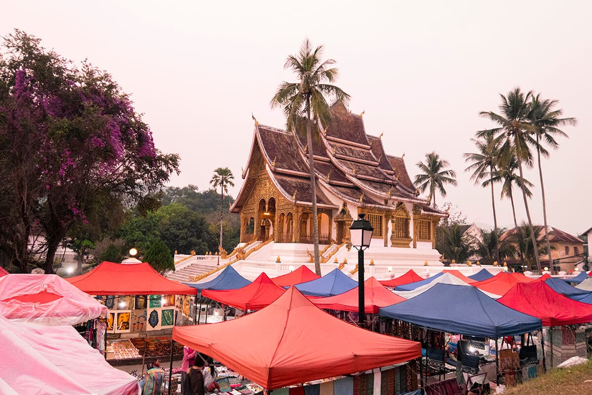 royal palace at the luang prabang night market during sunset