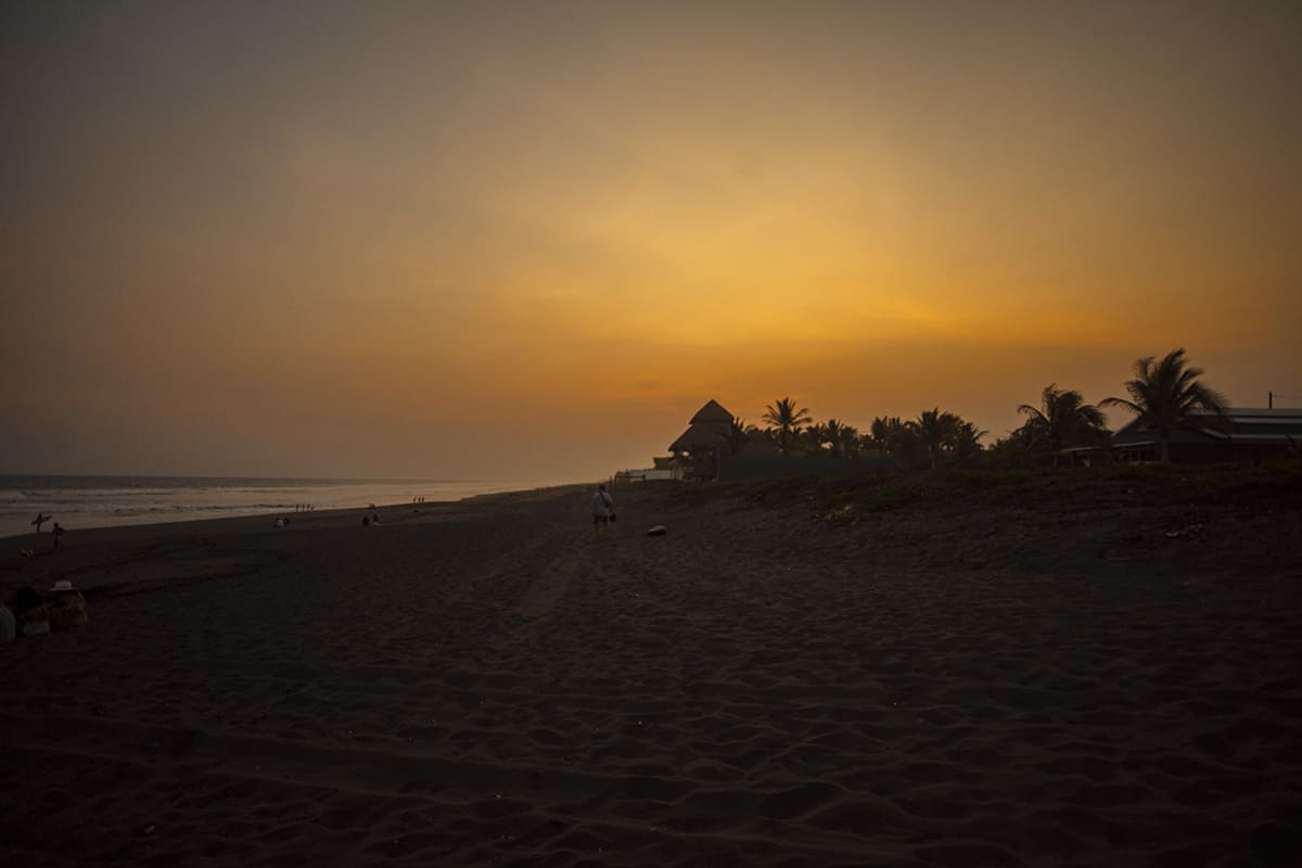3 Weeks In Guatemala Itinerary: BEST Route For First Timers 46 watching sunset on the beach in el paredon, the perfect way to end the day