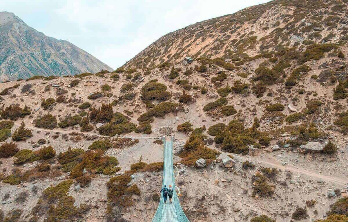 Annapurna Circuit Itinerary: All You Need To Know About The Best Trek In Nepal 23 manang to yak kharka crossing over bridge