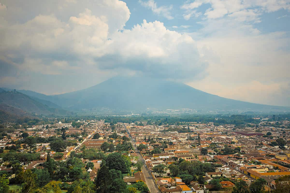 Backpacking Antigua In Guatemala On A Budget: Top Tips For Travelers 49 incredible view over the city of antigua with volcan de agua in the background