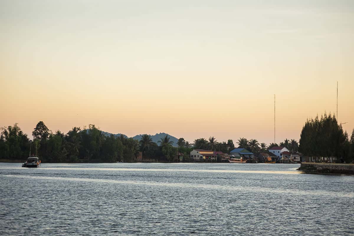 Backpacking Cambodia: BEST Travel Tips For 2025 45 sunset along the riverbank in kampot