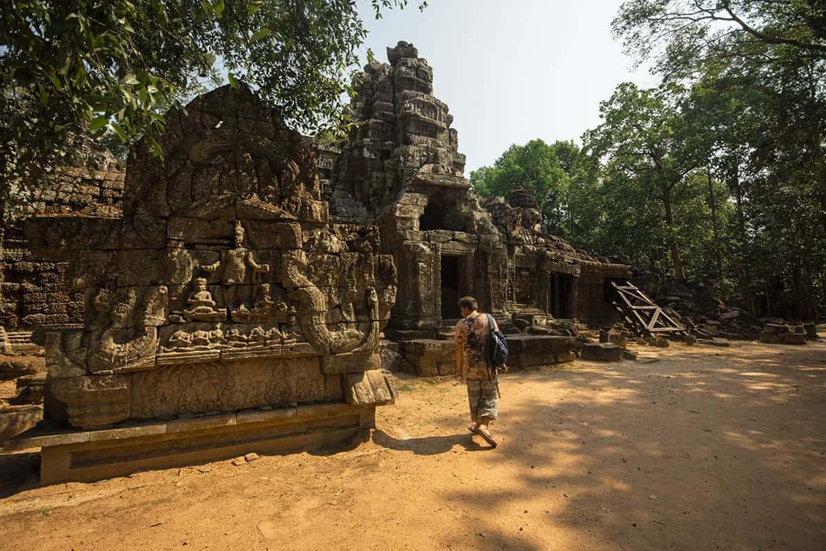 Backpacking Cambodia: BEST Travel Tips For 2025 31 exploring on of the temples in the angkor archeological complex