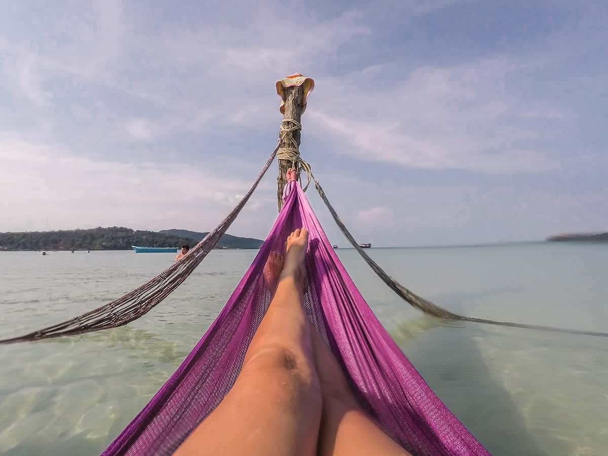 Backpacking Cambodia: BEST Travel Tips For 2025 56 relaxing in a hammock on saracen bay on koh rong samloem