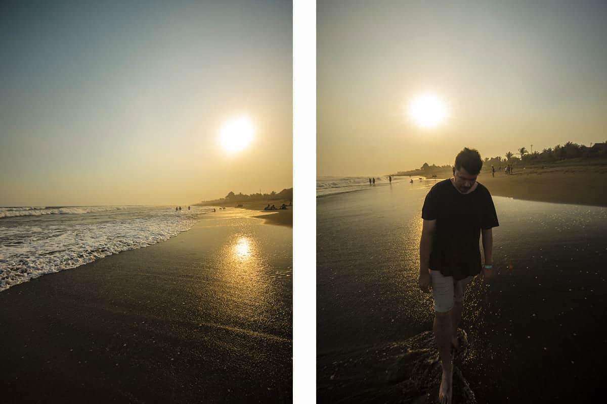 El Paredon For Budget Travelers: Is It Worth Visiting? 8 walking down the beach at el paredon in guatemala during sunset