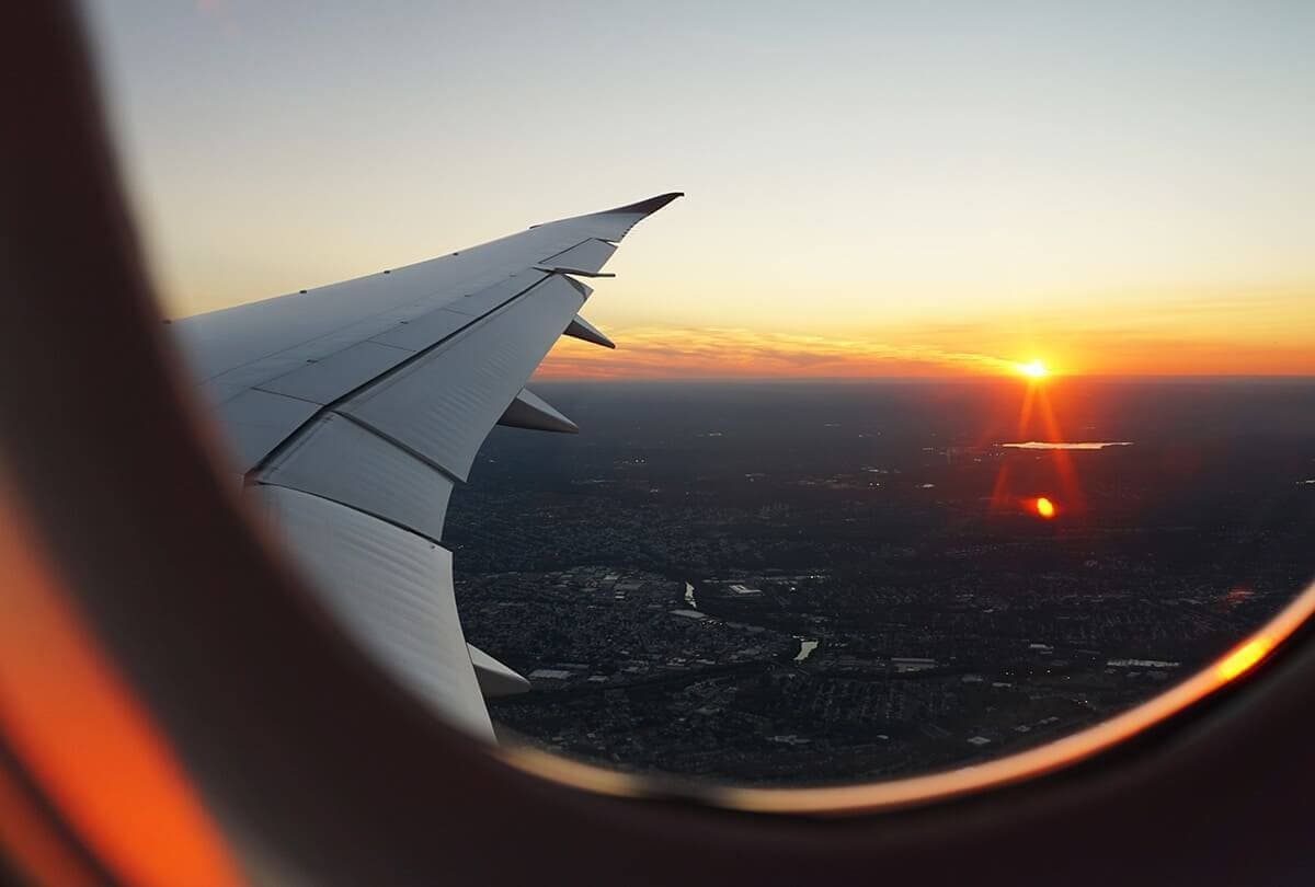 Backpacking Luang Prabang Guide: All You Need To Know 11 view out of plane window over laos