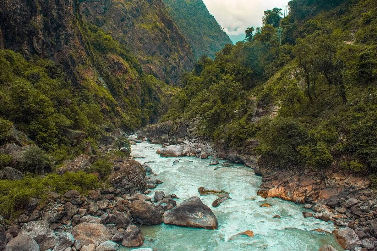 Day 2: Bahundanda To Tal On The Annapurna Circuit 2 blue river crossing bahundanda to tal annapurna circuit