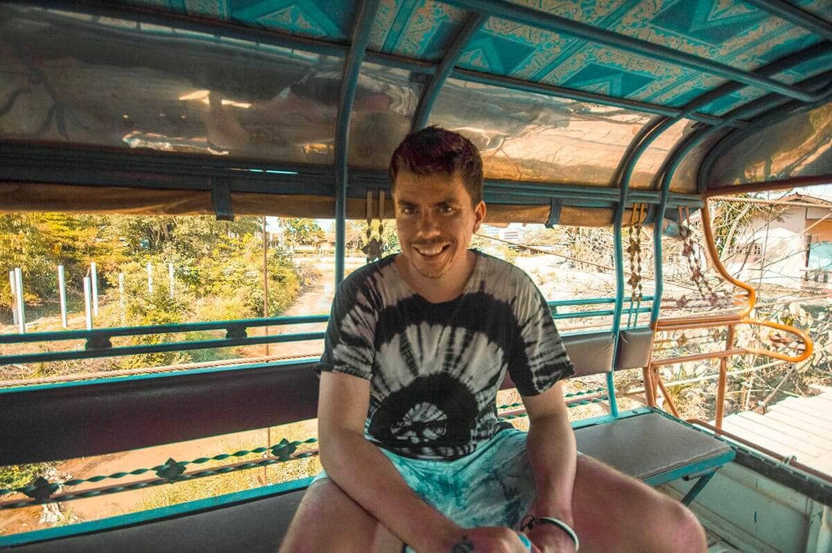 First Time In Southeast Asia? Group Tour VS Solo Travel 6 tuktuk transport as solo travelers in laos