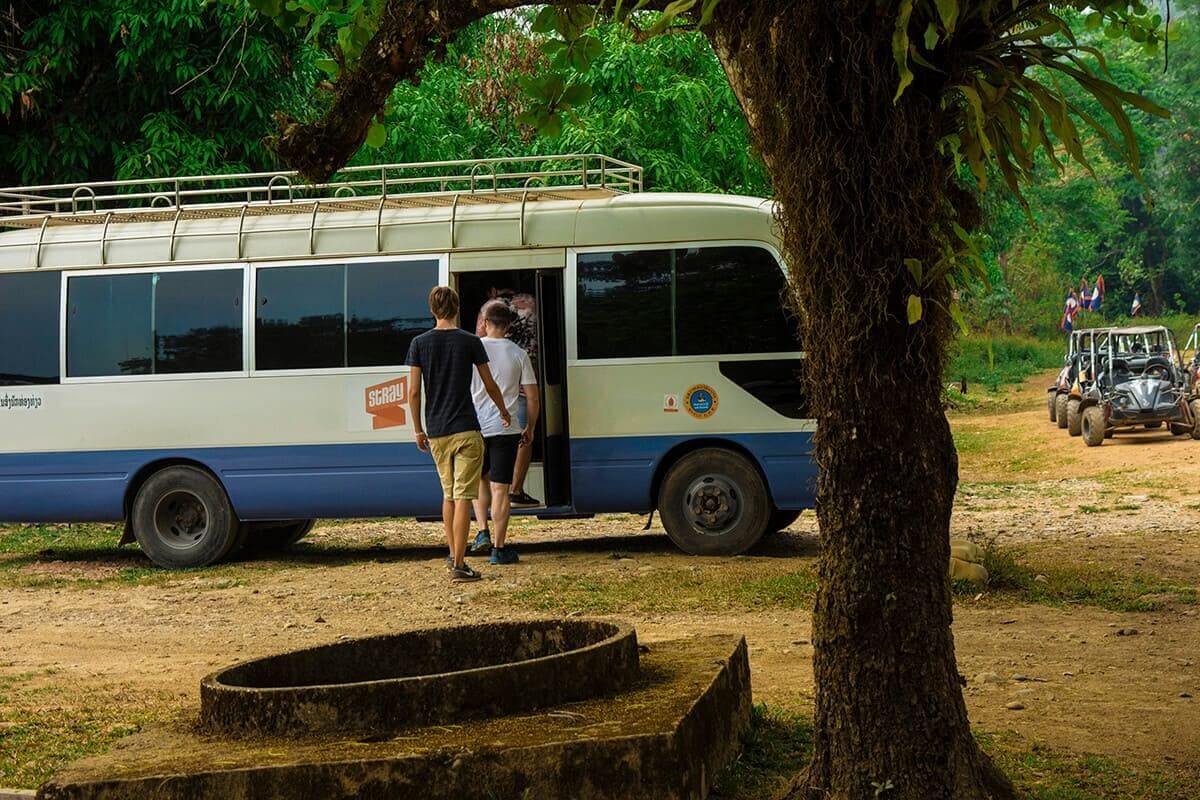 First Time In Southeast Asia? Group Tour VS Solo Travel 5 traveling with stray asia on the bus in laos