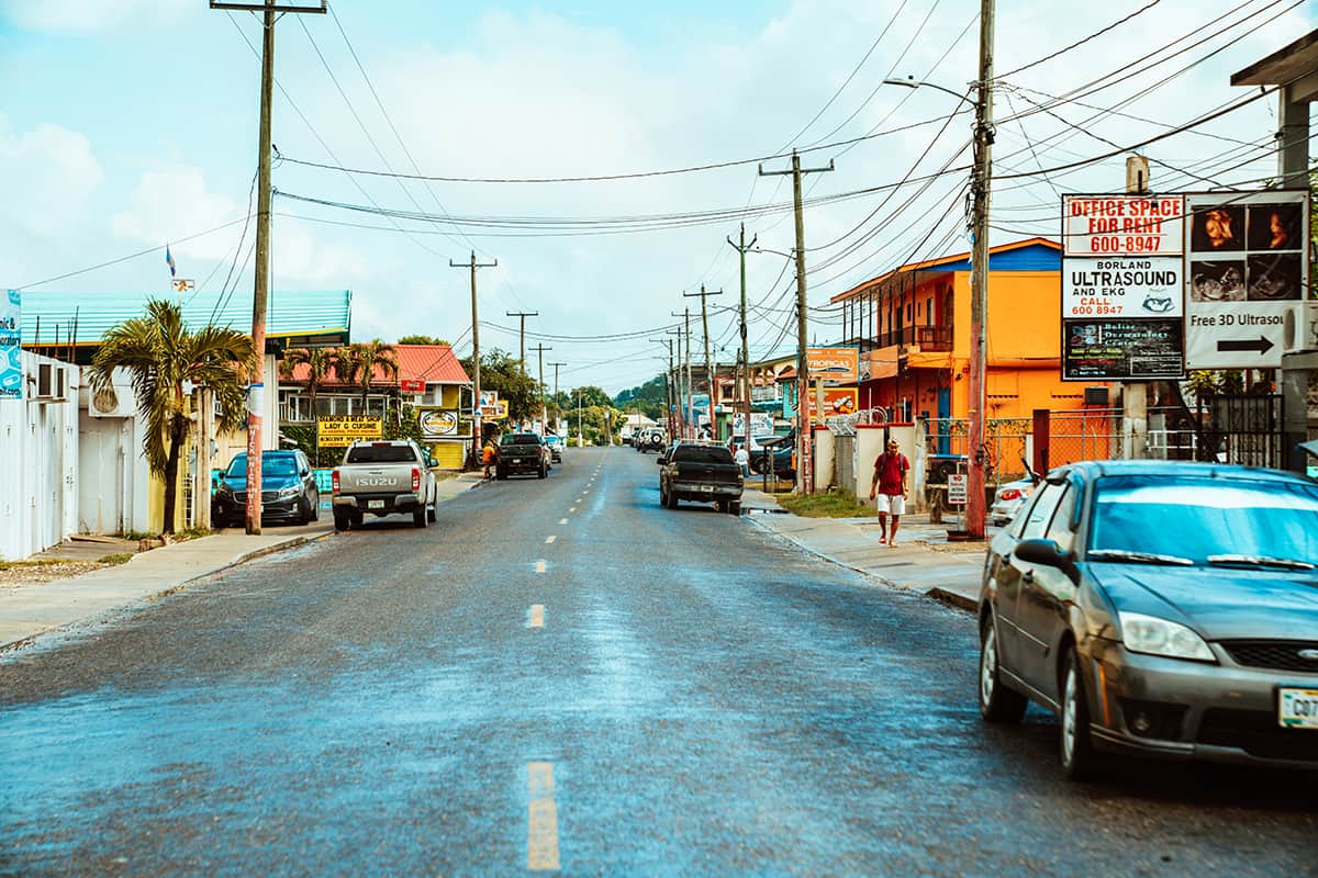 Belize City To San Ignacio: CHEAPEST Ways To Travel 6 looking down one of the main roads in san ignacio