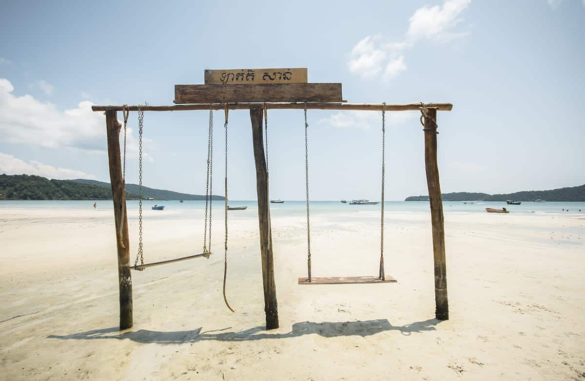 The 6 Best Beaches On Koh Rong Samloem 4 swings on the sand of saracen bay during low tide