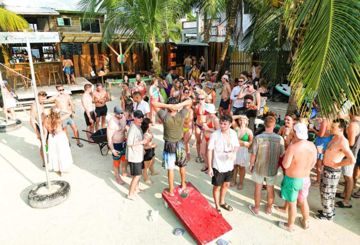 Hostels In Caye Caulker: BEST Stays For Backpackers 12 hanging out at one of the best hostels in caye caulker