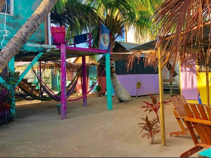 Hostels In Caye Caulker: BEST Stays For Backpackers 9 plenty of chill space including hammocks at tropical oasis hostel in caye caulker