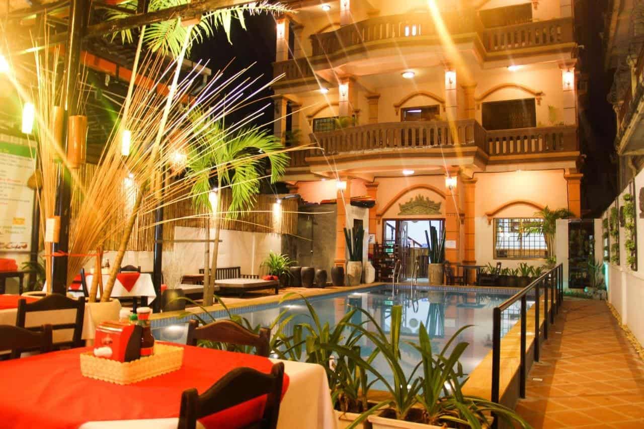 The Best Hostels In Siem Reap: Get The Most For Your Money 17 dinner around the pool at the tropical breeze guesthouse