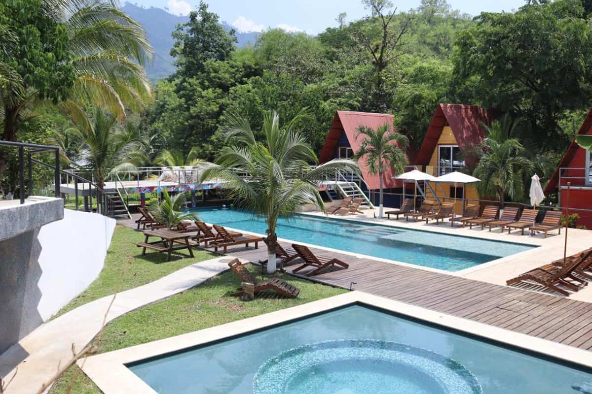 Best Hostels In Semuc Champey: For Solo Travelers, Females, Couples & More 31 hanging poolside at greengos one of the best hostels in semuc champey