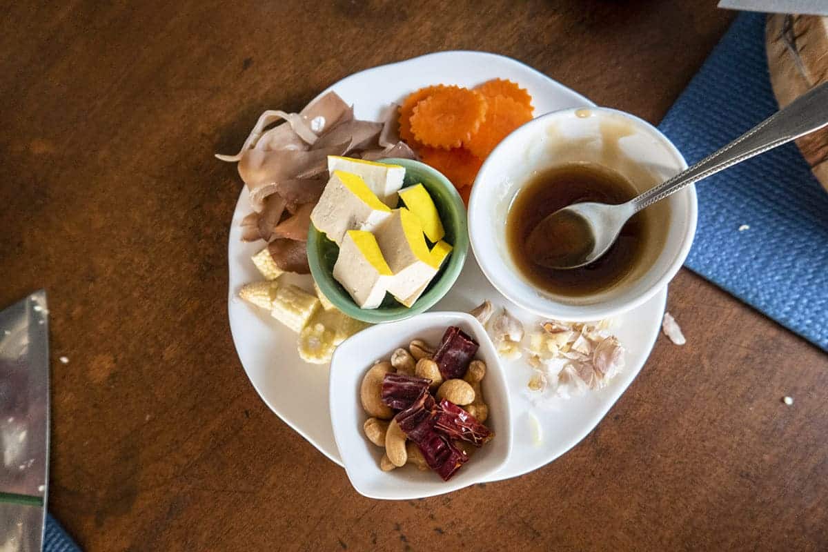 6 Best Vegetarian Cooking Classes In Chiang Mai Worth Booking 2025 4 making cashew nut tofu in my vegetarian cooking class in chiang mai