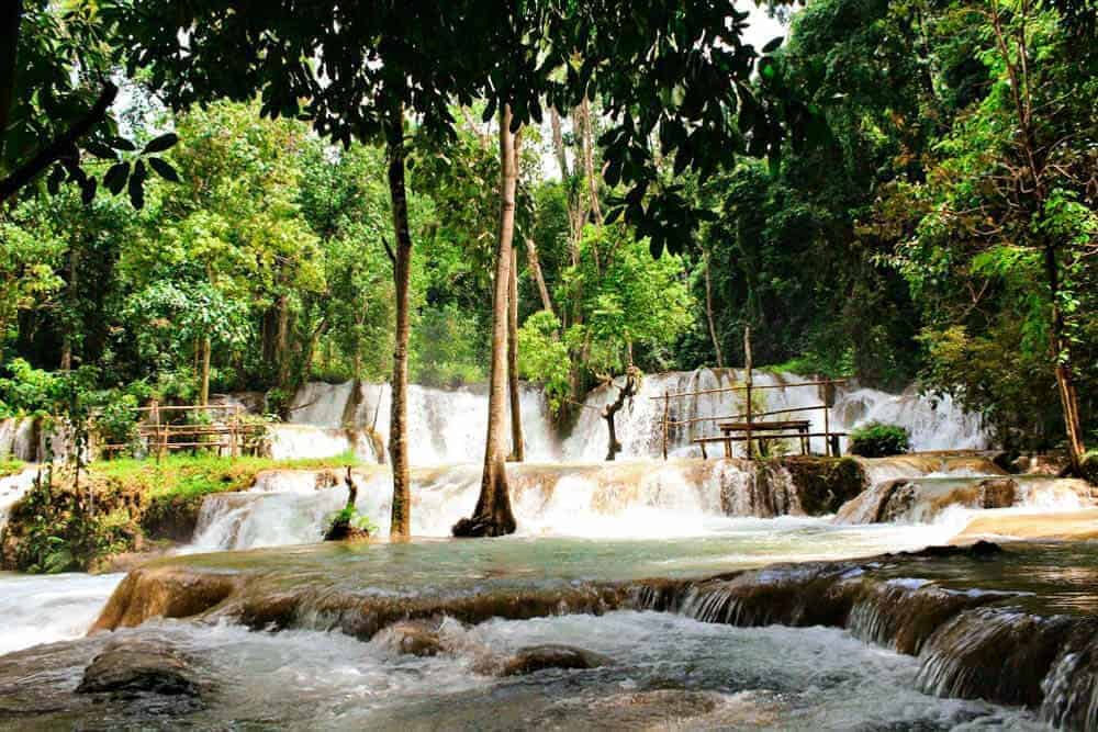 7 BEST Waterfalls In Laos You NEED To Explore 4 rushing waters at tad sae waterfall