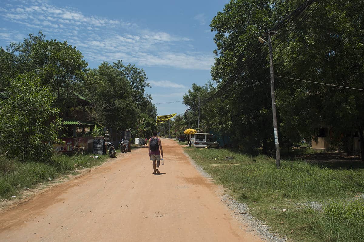Cost To Travel Cambodia: My $29.00 Per Day Travel Budget 15 walking through some of the back streets in otres
