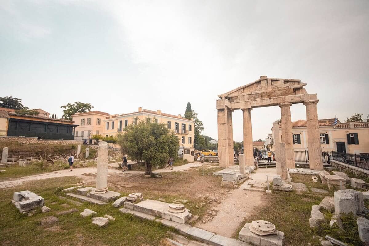 The Cost To Travel Greece And How Expensive Is It? 13 crowds at a historic sight in athens cost to travel greece