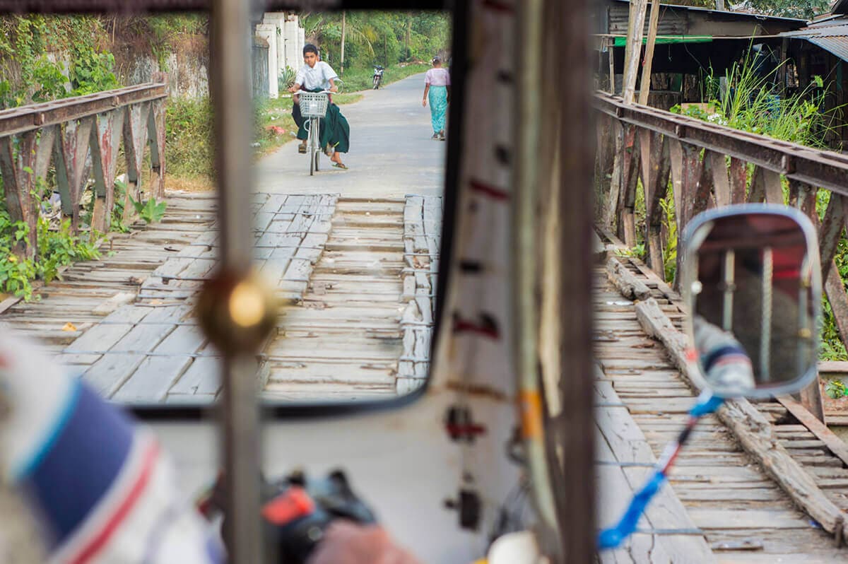 Exploring Dala Township, Yangon, Myanmar 8 tuktuk on bridge dala township yangon