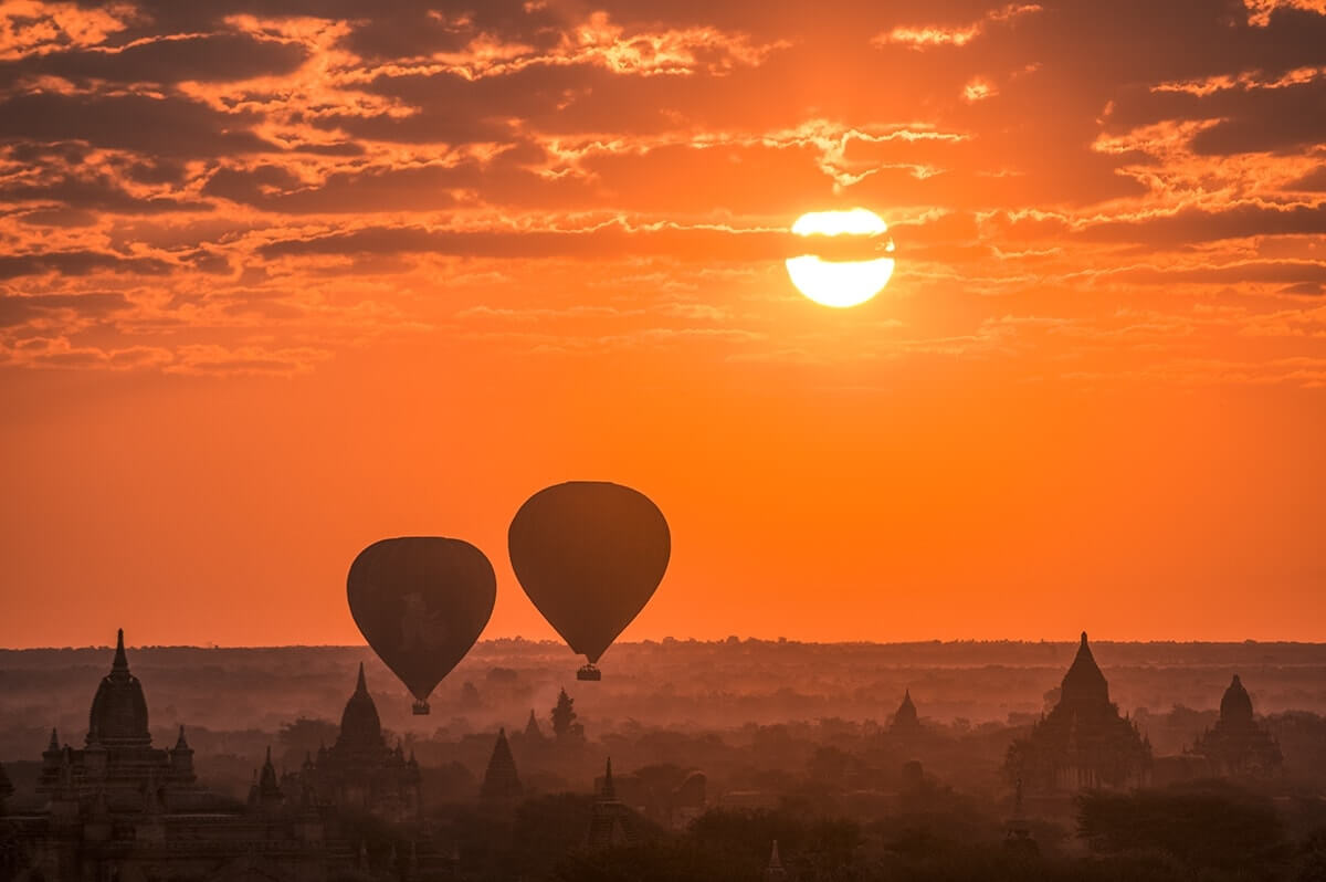 How To Explore The Temples In Bagan, Myanmar 7 zoom shot of the temples in bagan with hot air balloons