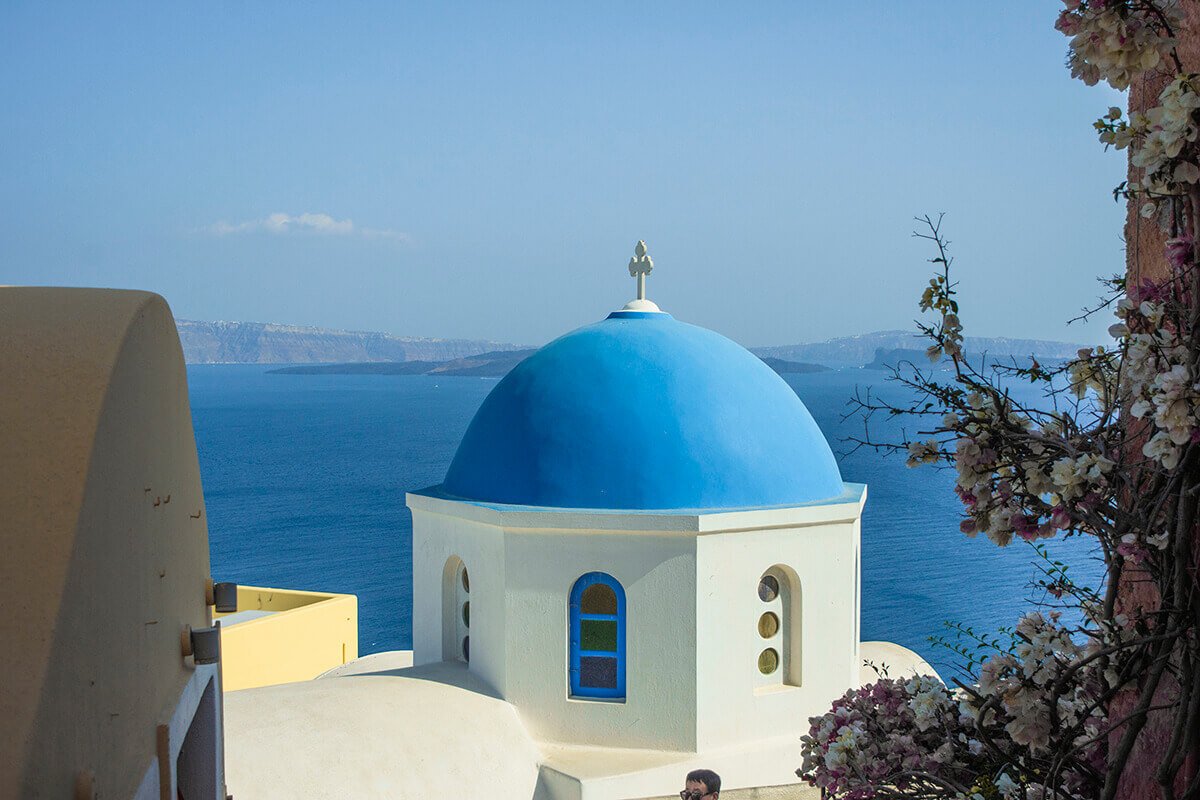 Sightseeing Santorini- Exploring In A Private Taxi With Santorini Best Tours 7 flowers and blue church in oia sightseeing santorini