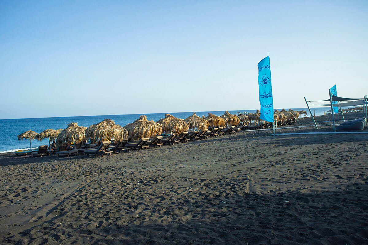 Sightseeing Santorini- Exploring In A Private Taxi With Santorini Best Tours 17 black beach chairs sightseeing santorini