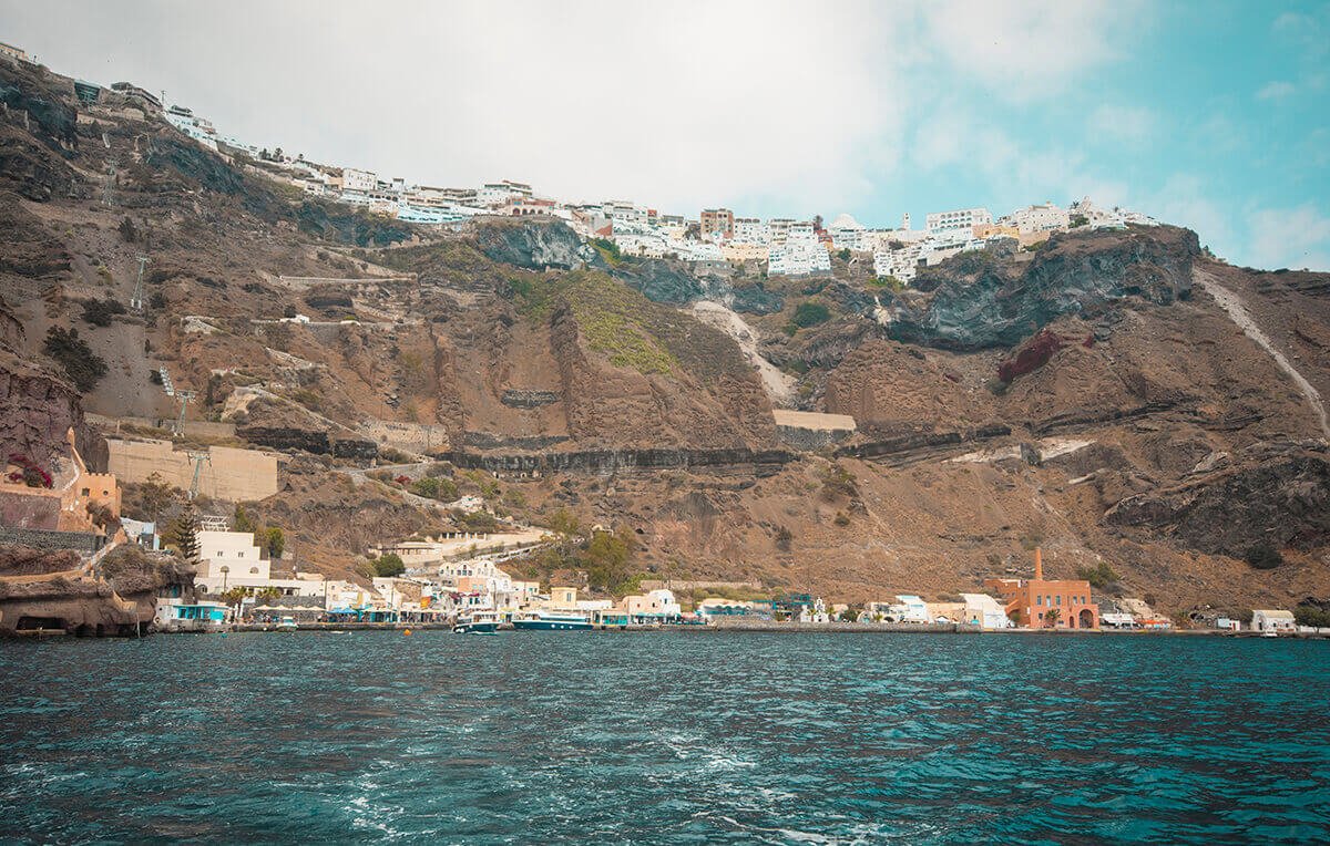 Volcano Tour In Santorini: What To Expect 1 fira port over ocean view