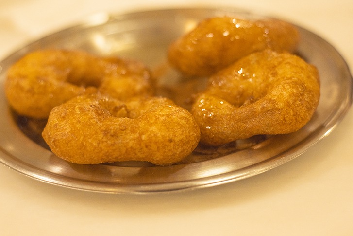 Discovering The Athens Food Scene With Athens Walking Tours 9 delicious greek donuts covered in syrup