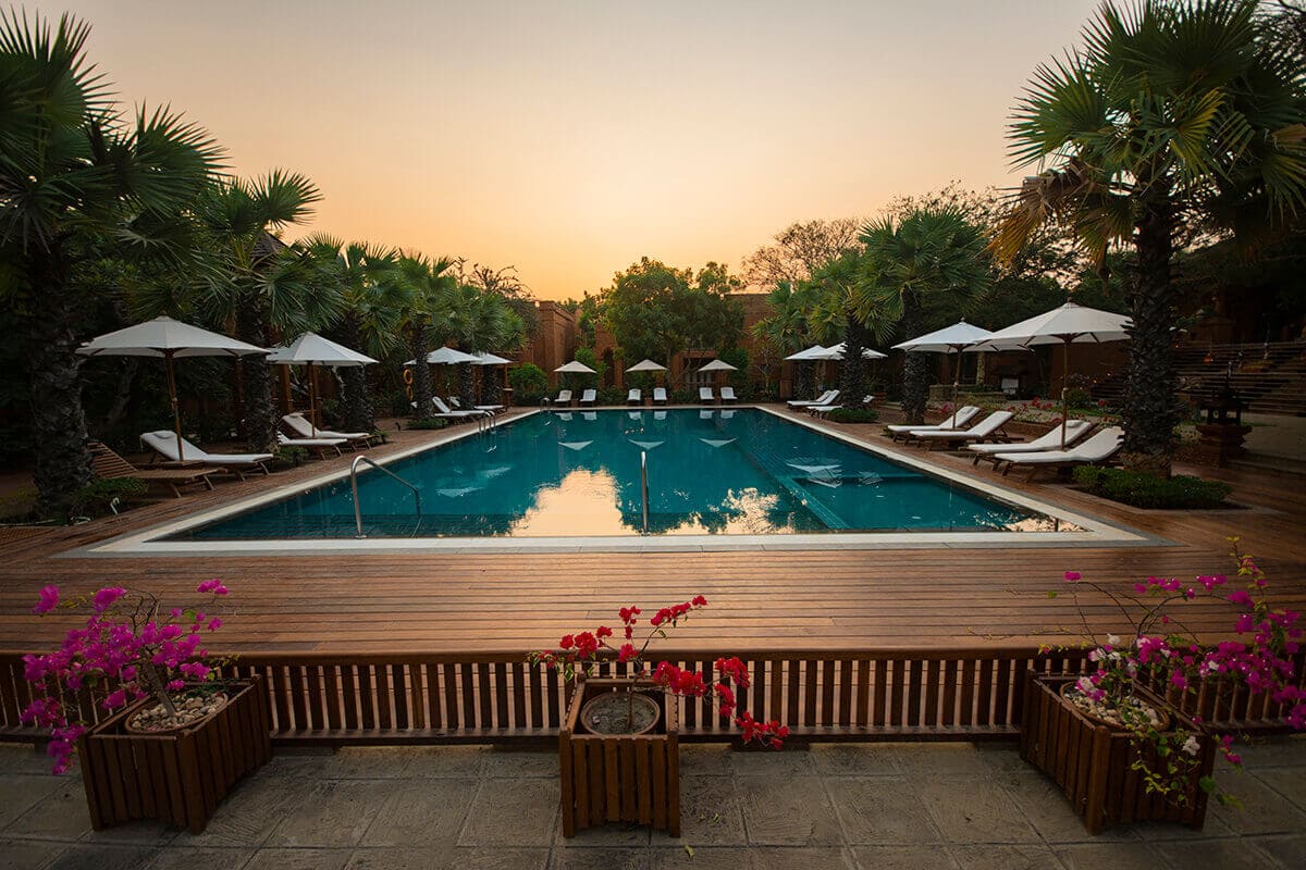 Heritage Bagan Hotel Review: A Luxurious Stay In Bagan 5 sunset by poolside heritage bagan hotel review