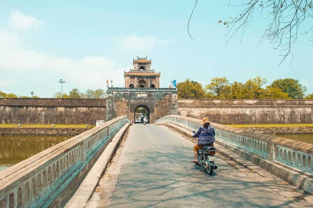 Imperial City Of Hue: What You NEED To Know 13 walking the streets of hue over bridge