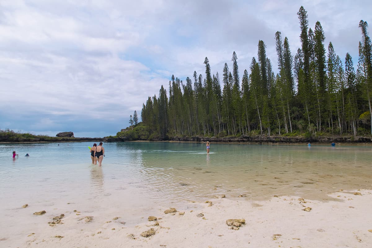 Isle Of Pines Natural Pool: Why You NEED To Visit 2025 10 tourists hanging out and going for a snorkel at the natural pool in the isle of pines