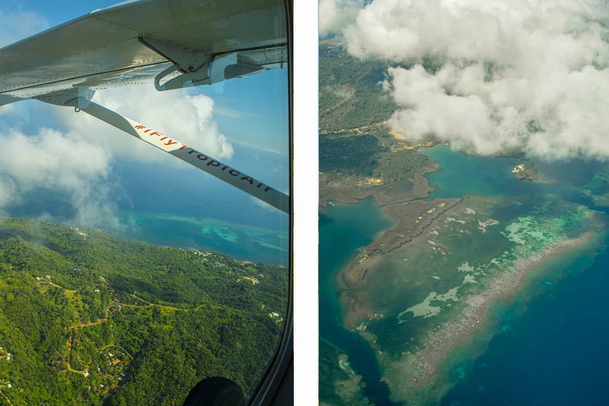 Backpacking Roatan & BEST Hostels In Roatan (2025) 28 incredible views flying over roatan to the jungle and coral reefs below