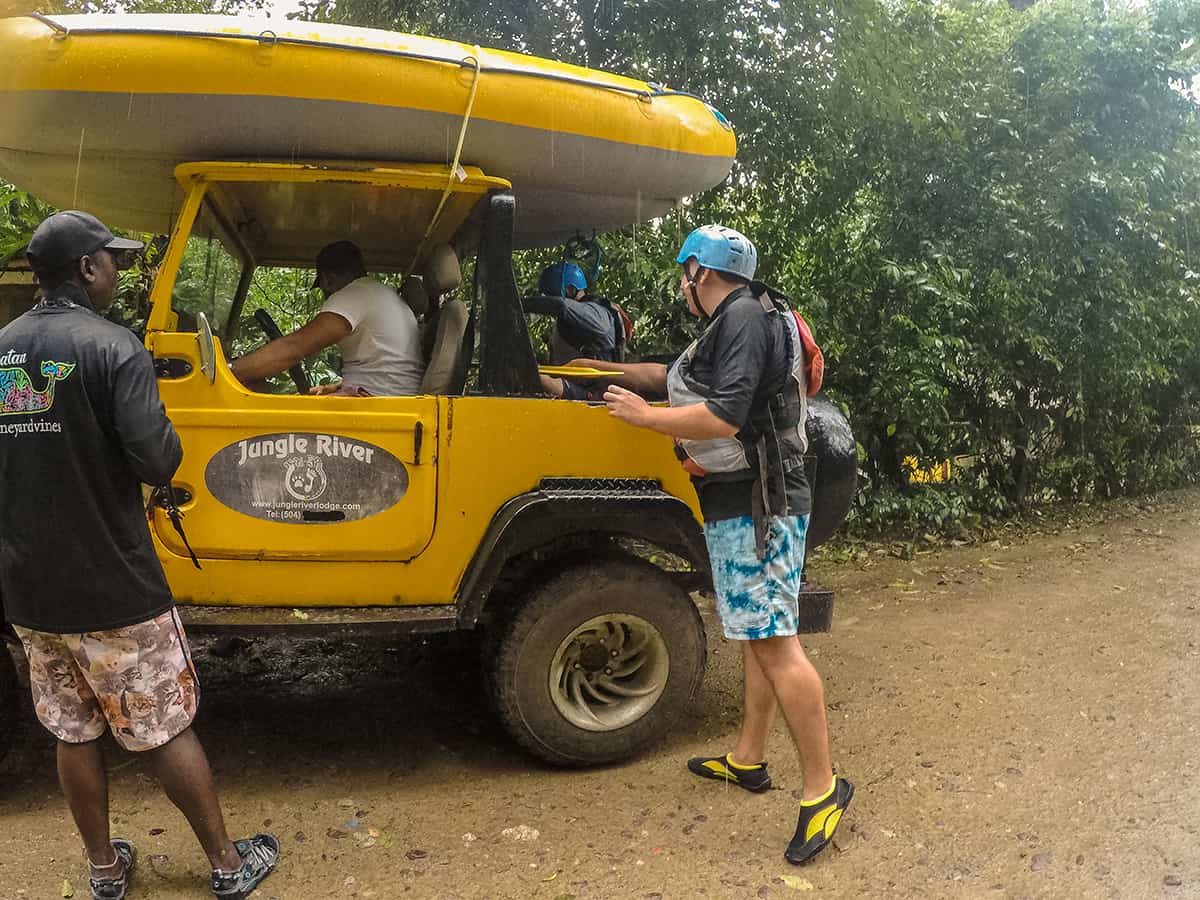 Pico Bonito National Park: How To Visit, What To Do, Is It Worth It & More 19 loading up the jeep on a rainy day ready to venture up stream