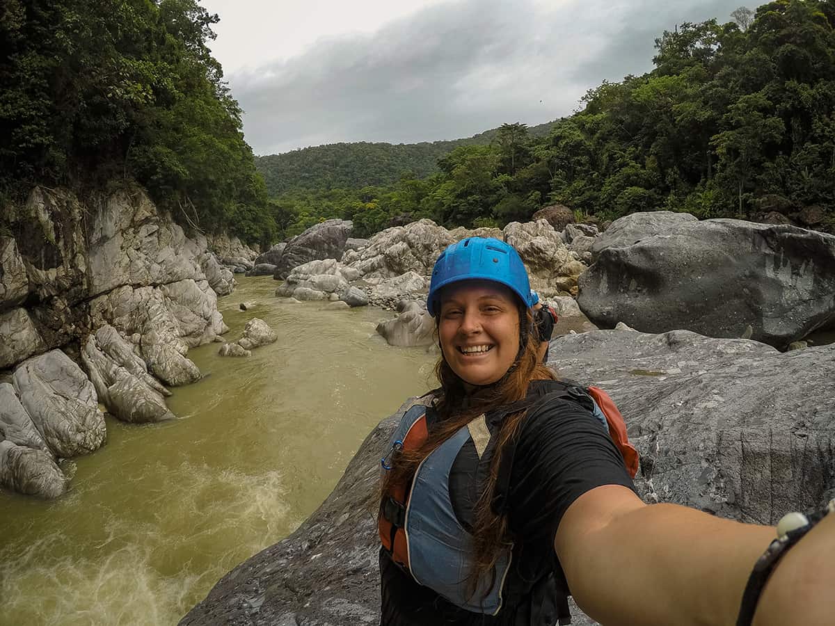 Pico Bonito National Park: How To Visit, What To Do, Is It Worth It & More 15 go pro selfie while jumping off the boulders at pico bonito national park