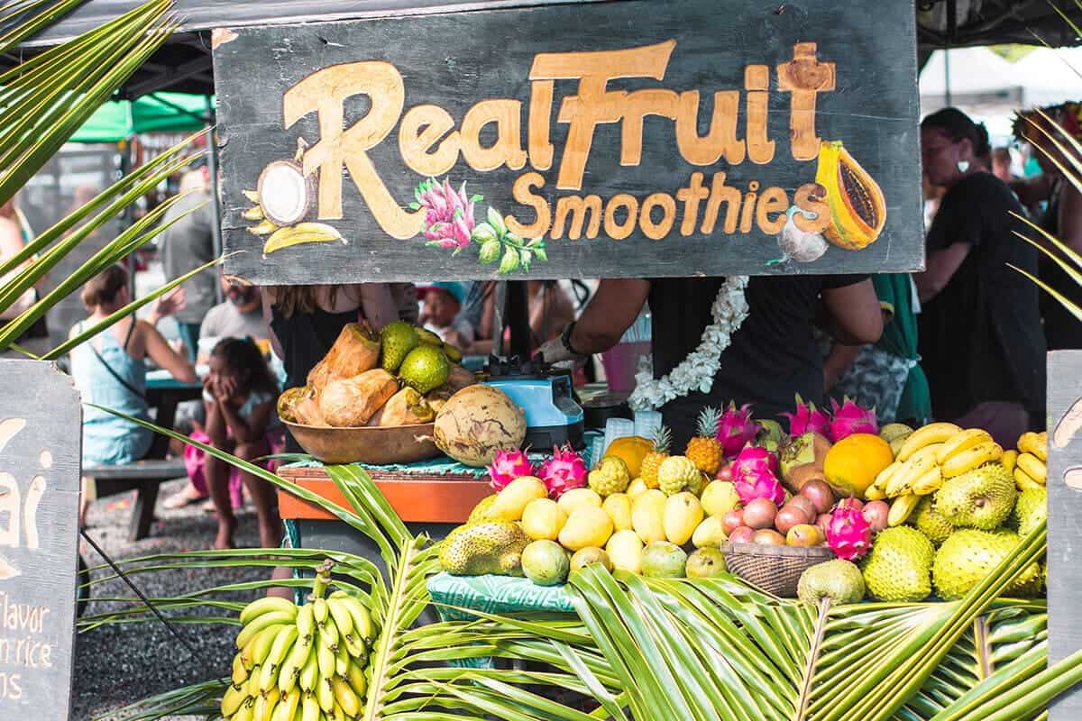 Punanga Nui Market: The Perfect Saturday Morning In Rarotonga 18 an assortment of fresh fruits at a smoothie stand in rarotonga