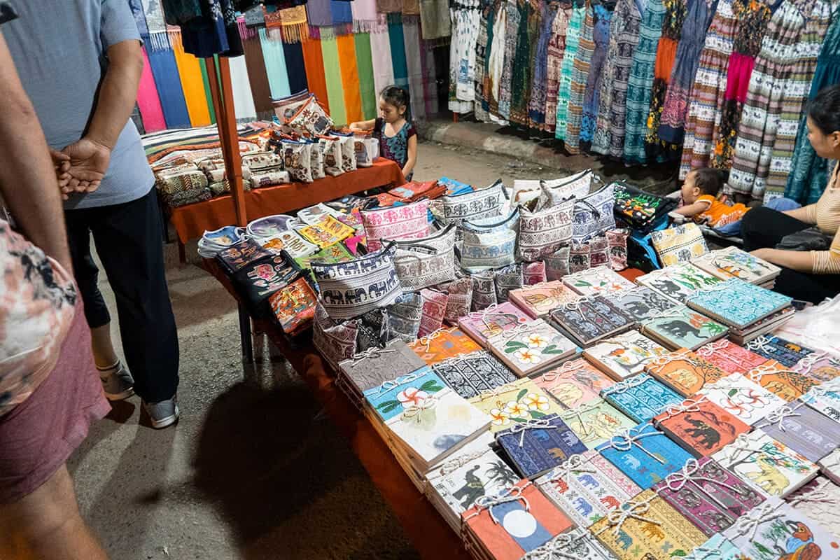 Scams In Laos: 7 Scams Travelers NEED To Know (2025) 5 shopping at the vang vieng night market