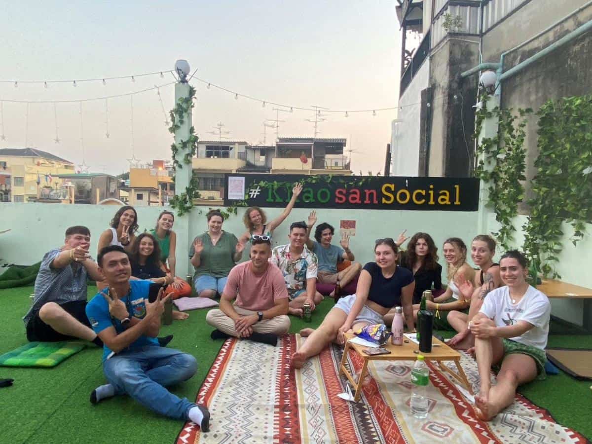 17 BEST Hostels On Khao San Road For Travelers! (2025) 8 hanging on the rooftop and meeting new friends at khao san social capsule hostel