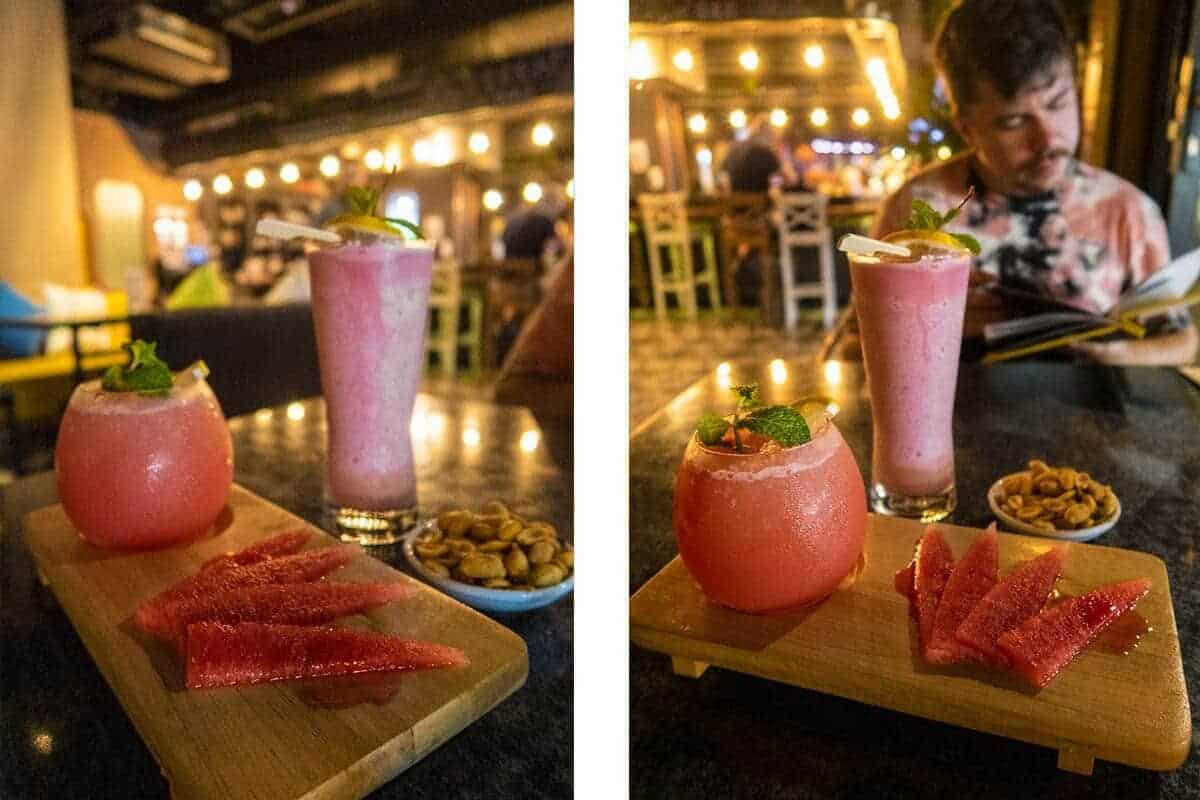 Backpacking Thailand On A Budget: What Travelers Should Know 12 enjoying a cocktail in bangkok