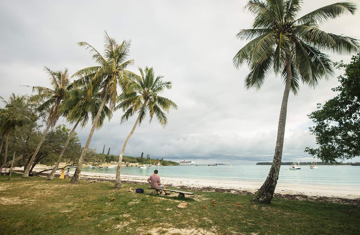 Things To Do In Isle Of Pines: For Cruise Passengers & More 12 hanging out at kuto bay in isle of pines with the cruise ship anchored