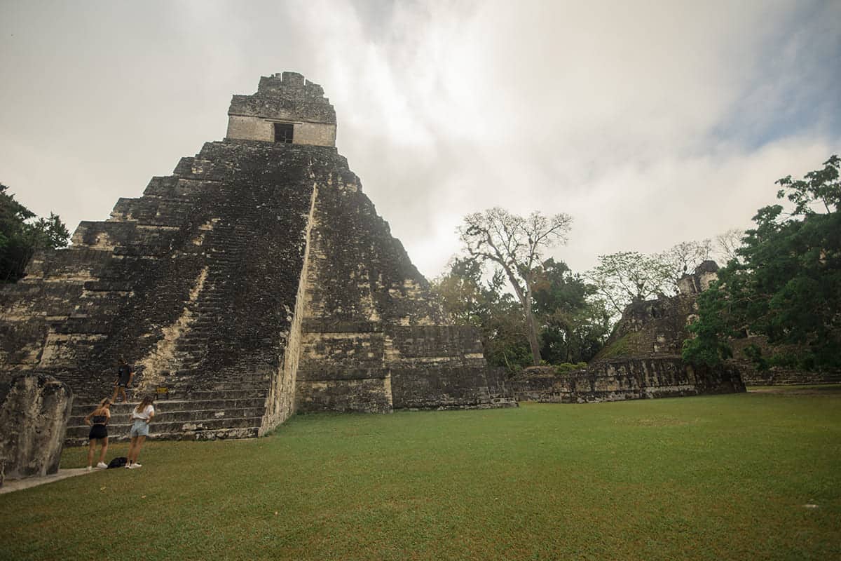 Tikal Tour From Flores: Is It Worth Booking? 41 checking out the great jaguar temple from inside the grand plaza on our tikal tour from flores
