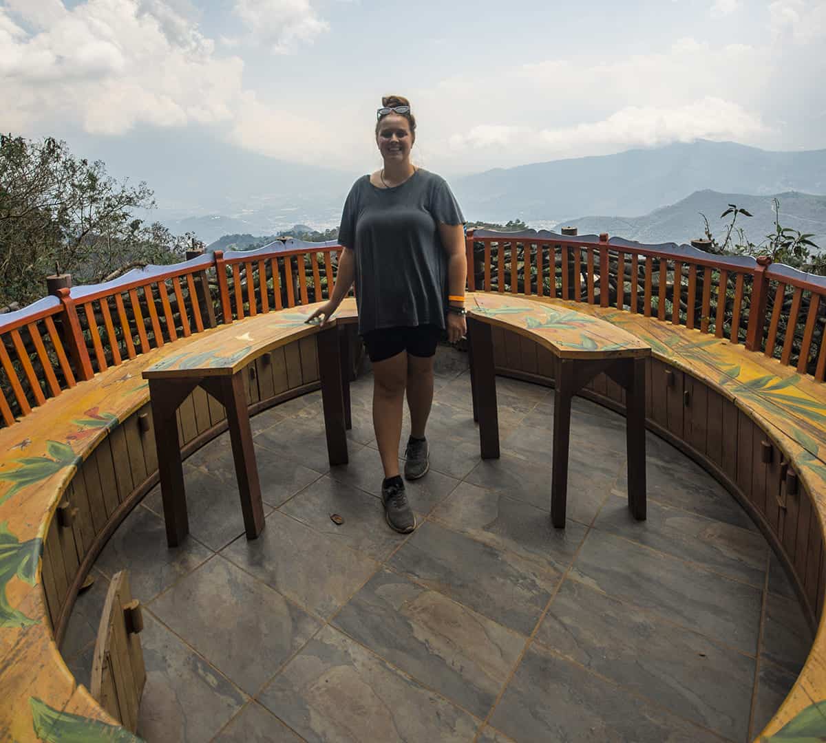 Visiting Hobbitenango: What You NEED To Know 2025 13 checking out the beautifully painted nest at hobbitenango