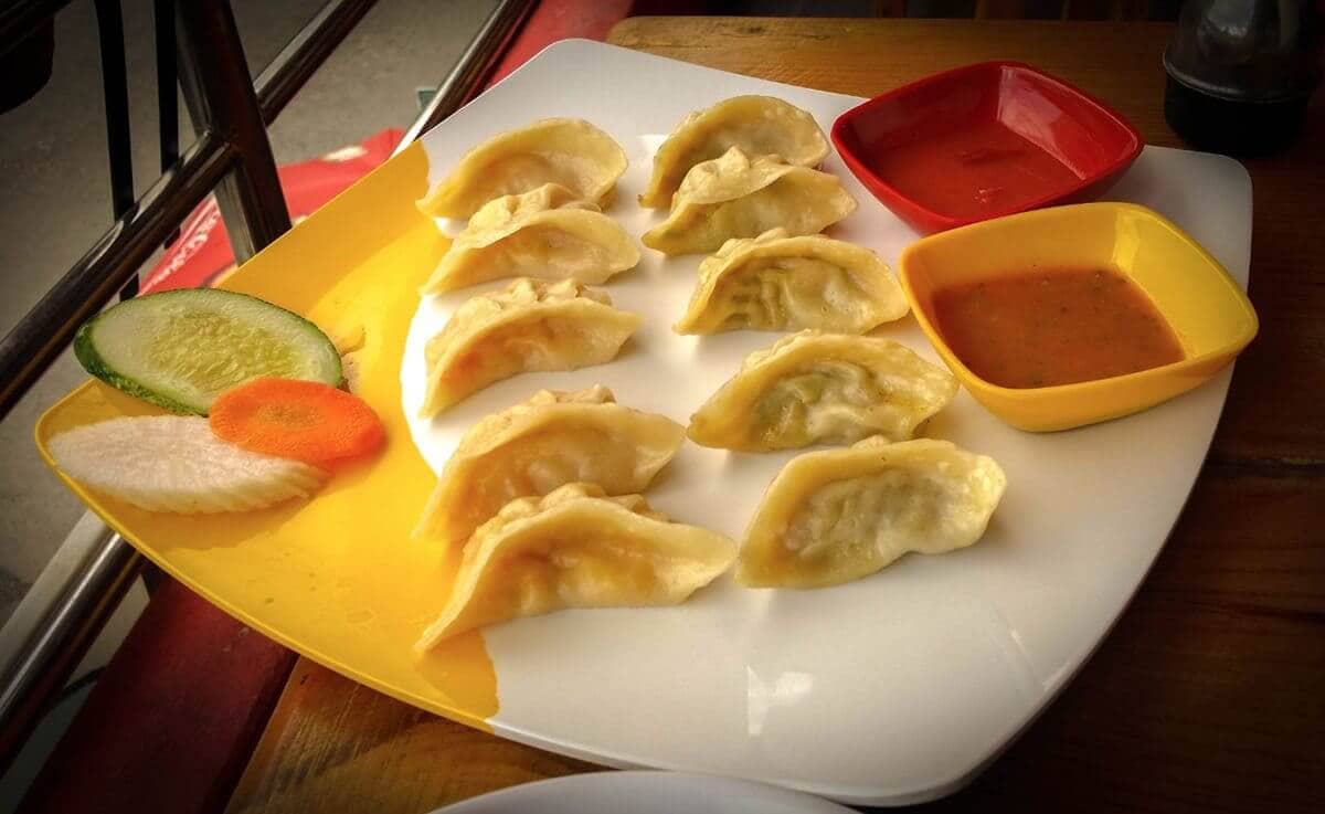 Where To Eat In Pokhara: The Best Cafes And Restaurants 12 steamed momos from mo2 delight in pokhara