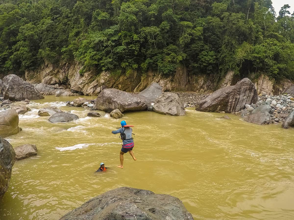 Best White Water Rafting In La Ceiba, Honduras: All You Need To Know 21 jumping off one of the boulders into the cangrejal river