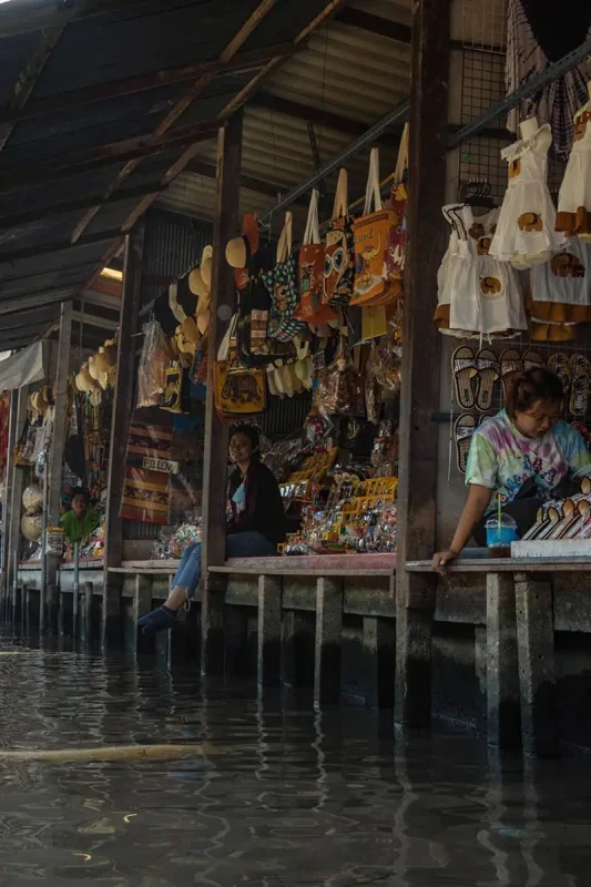 2 Days In Bangkok Itinerary: The ULTIMATE Guide 2025 18 sellers in stalls over the water which your boat will visit on a floating market tour while on your bangkok itinerary