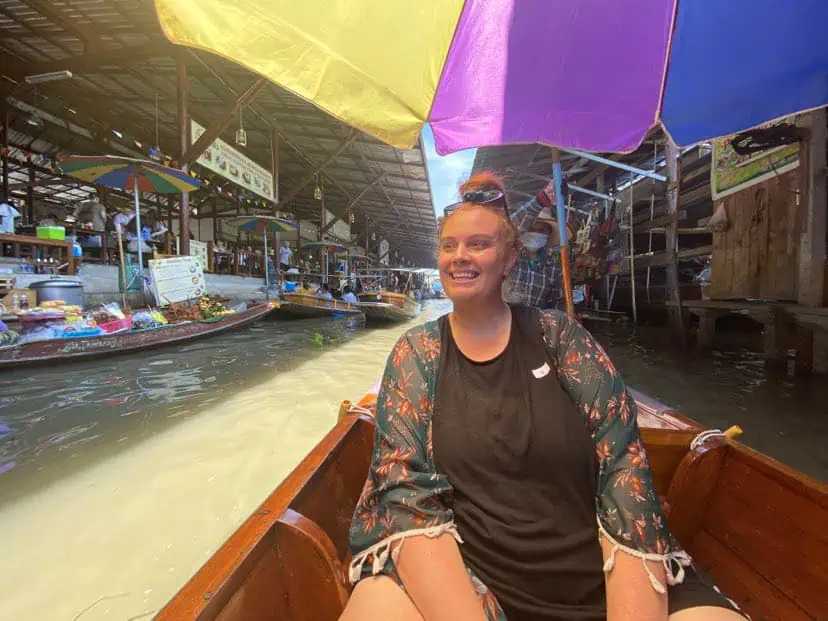 2 Days In Bangkok Itinerary: The ULTIMATE Guide 2025 20 tasha amy on a boat at the Damnoen Saduak floating Market in bangkok