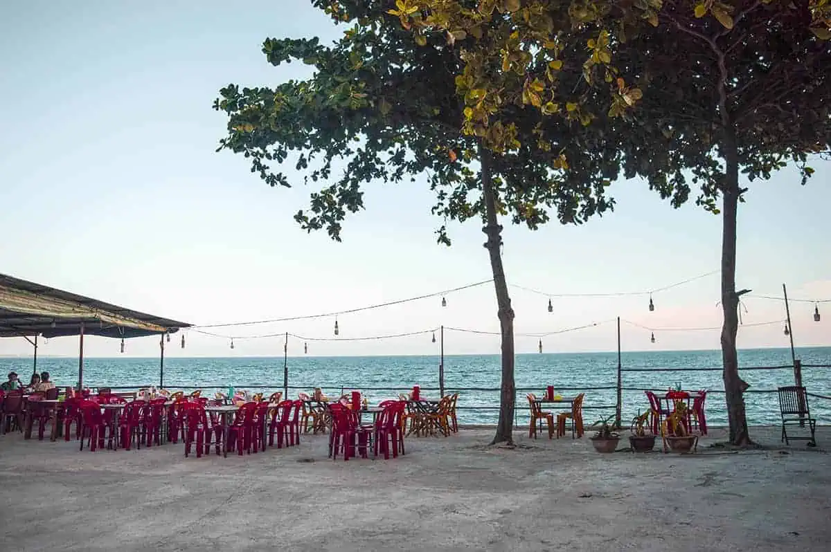 Is Mui Ne Worth Visiting & BEST Mui Ne Itinerary (2025) 7 a seaside restaurant during sunset in mui ne