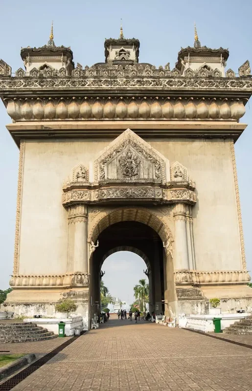 2 Weeks In Laos Itinerary: BEST Route North To South 24 looking straightforward towards patuxai in vientiane