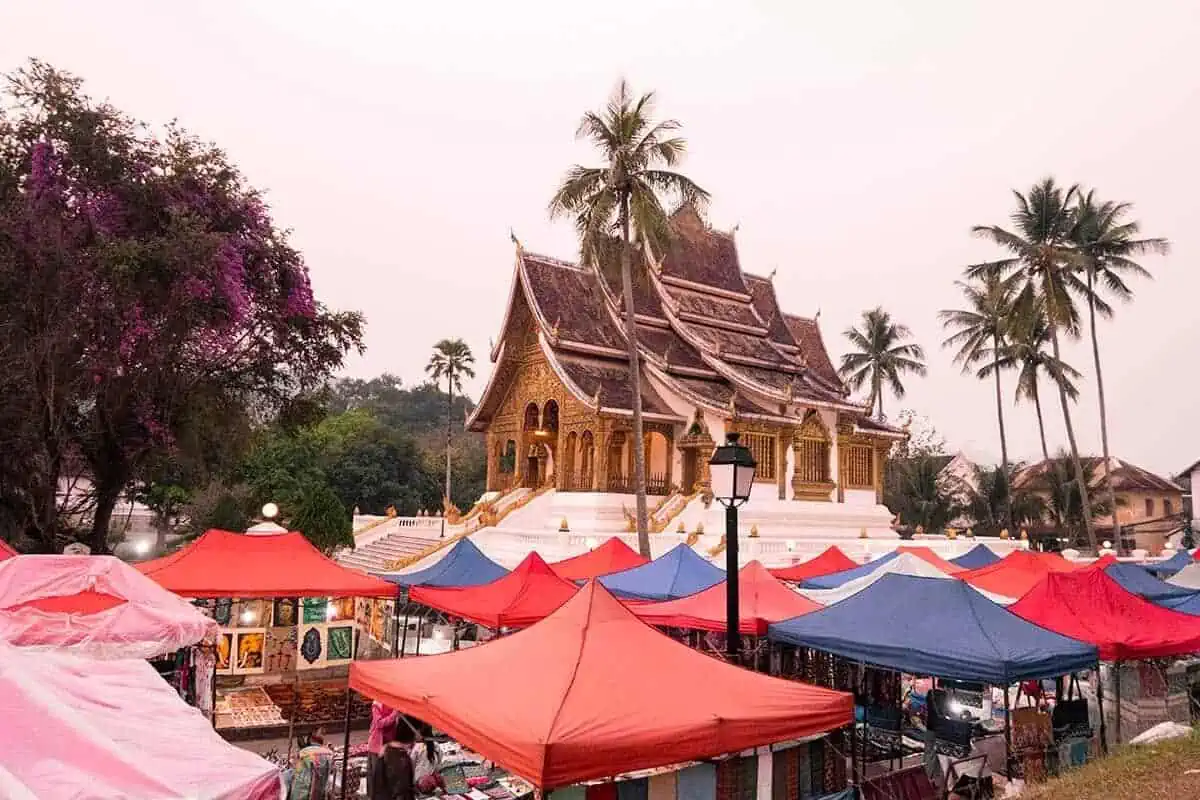 2 Weeks In Laos Itinerary: BEST Route North To South 14 the luang prabang night market during sunset