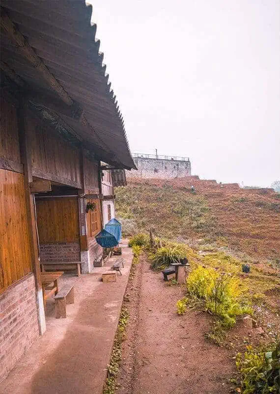 3 Days In Sapa Itinerary: The ULTIMATE Guide (2025) 11 a hammock hanging up outside our sapa homestay on a foggy day