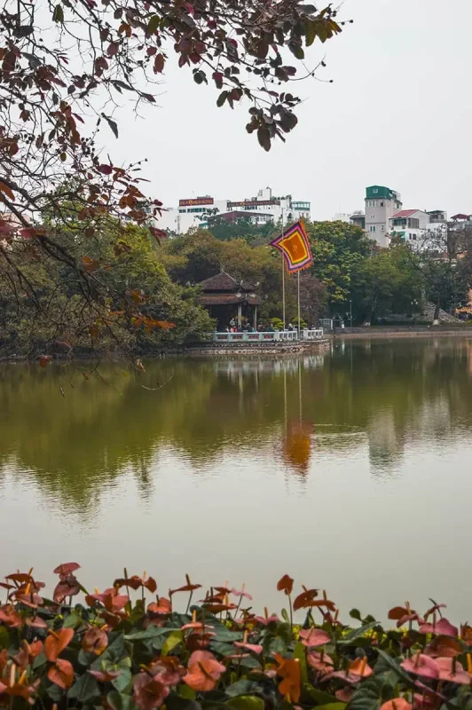 3 Week Vietnam Itinerary: BEST North To South Route 6 Tranquil Hoan Kiem Lake with a view of Turtle Tower, a peaceful retreat in a busy Vietnam itinerary